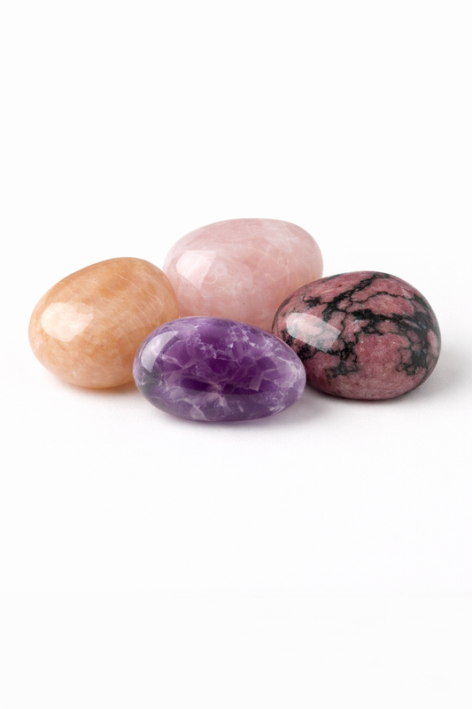 Four colorful stones on a white background