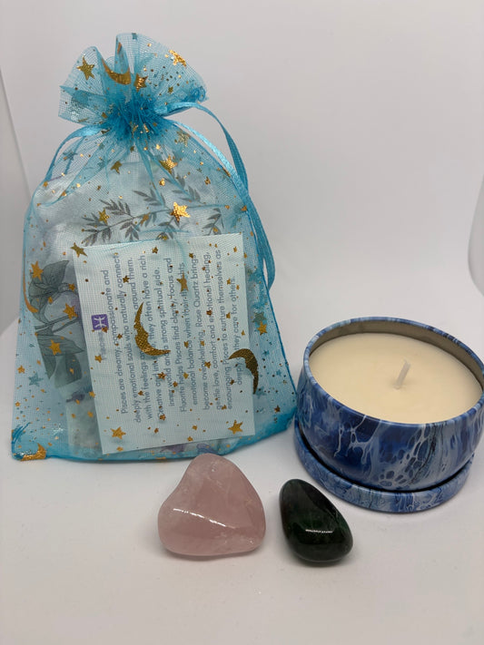 Candle, stones, and a decorative bag with text on a white background
