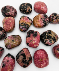 Collection of multicolored stones on a white background