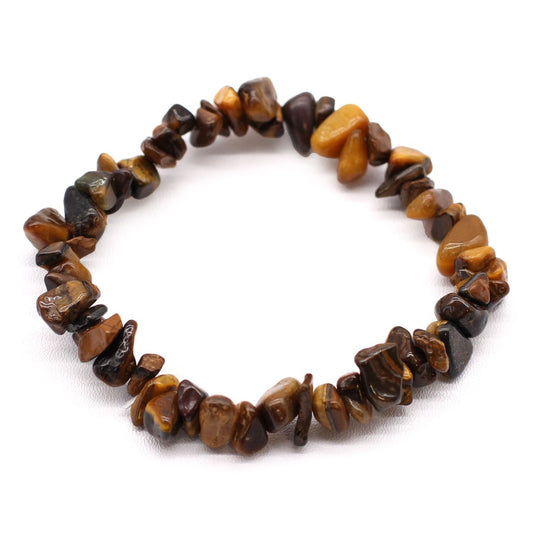 Bracelet made of brown and orange stone beads on a white background