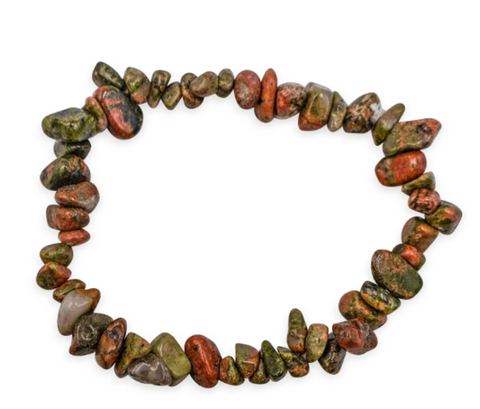 Bracelet made of multicolored stone beads on a white background
